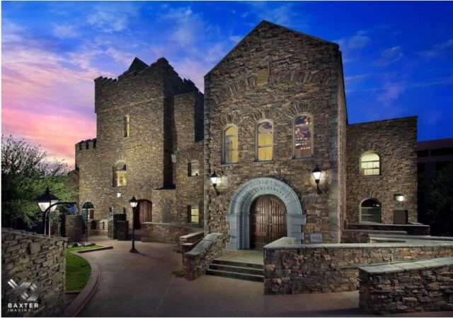 A stone library at night